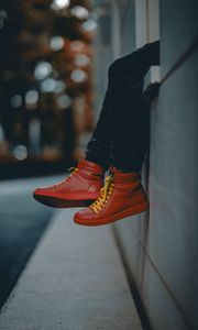 Preview wallpaper lonely, sneakers, red, legs, street