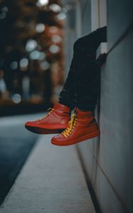 Preview wallpaper lonely, sneakers, red, legs, street