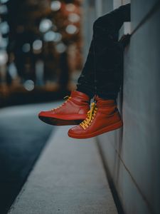 Preview wallpaper lonely, sneakers, red, legs, street