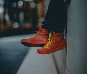 Preview wallpaper lonely, sneakers, red, legs, street