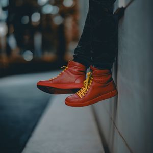 Preview wallpaper lonely, sneakers, red, legs, street