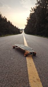 Preview wallpaper longboard, skateboard, road, marking, distance