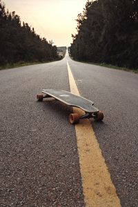 Preview wallpaper longboard, skateboard, road, marking, distance