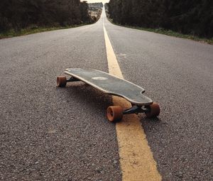 Preview wallpaper longboard, skateboard, road, marking, distance