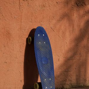 Preview wallpaper longboard, skateboard, wall, shadow