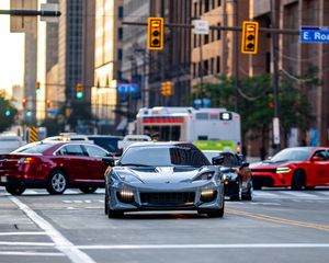 Preview wallpaper lotus, car, gray, road