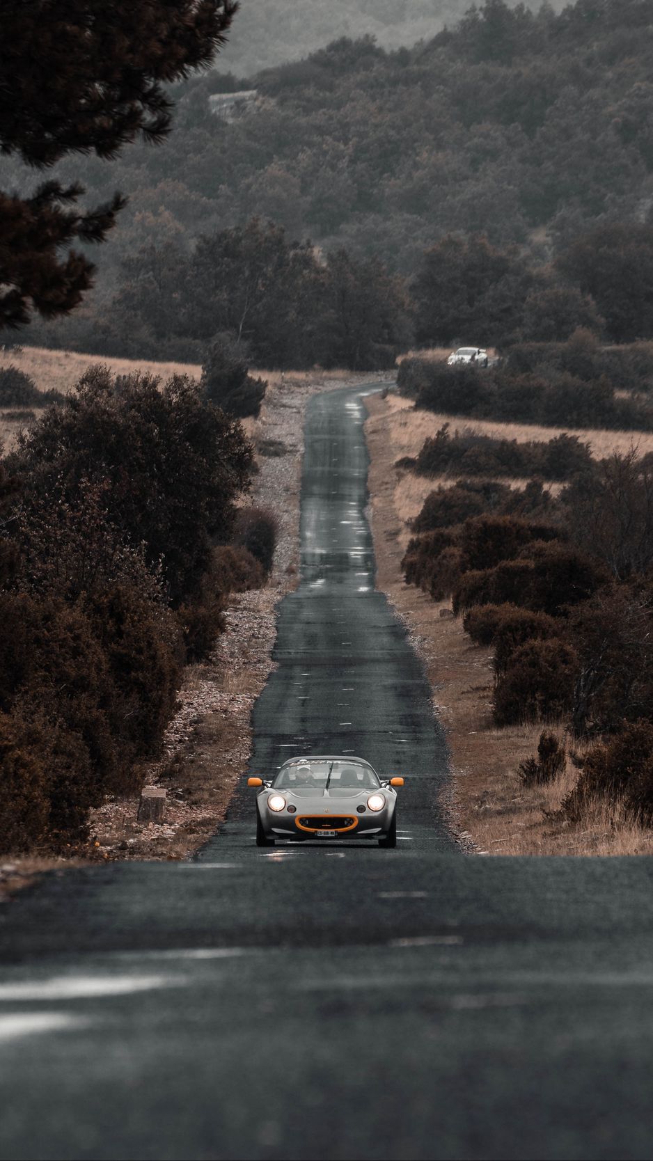 Download wallpaper 938x1668 lotus, car, sports car, black, road iphone  8/7/6s/6 for parallax hd background
