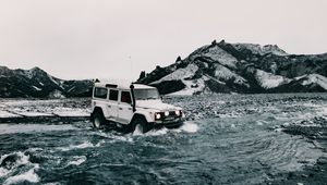 Preview wallpaper machine, suv, water, rocks