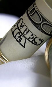 Preview wallpaper macro, money, dollars, rings