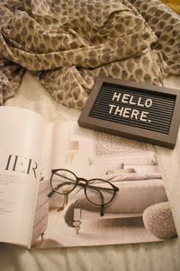 Preview wallpaper magazine, glasses, inscription, words