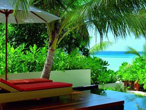 Preview wallpaper maldives, greens, vegetation, tropics, resort, chairs, palm trees, chaise lounge