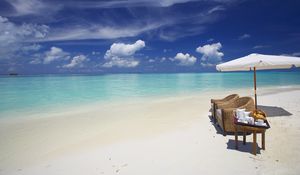 Preview wallpaper maldives, ocean, beach, sand, water, clouds, umbrella