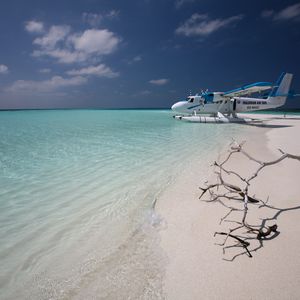 Preview wallpaper maldives, plane, coast, snag