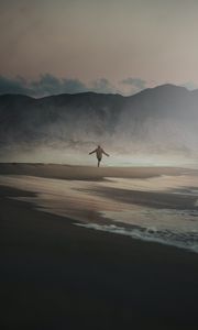 Preview wallpaper man, alone, beach, rocks, fog