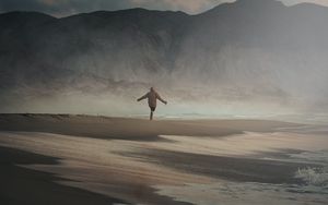 Preview wallpaper man, alone, beach, rocks, fog