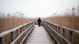 Preview wallpaper man, alone, bridge, nature