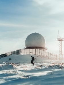 Preview wallpaper man, alone, building, ball, snow, winter, white