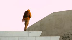 Preview wallpaper man, alone, building, minimalism