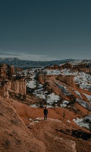 Preview wallpaper man, alone, canyon, rocks, snow