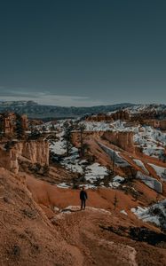 Preview wallpaper man, alone, canyon, rocks, snow