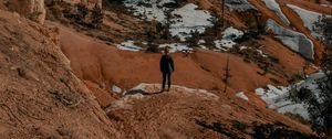 Preview wallpaper man, alone, canyon, rocks, snow