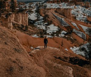 Preview wallpaper man, alone, canyon, rocks, snow