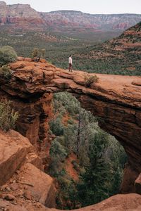 Preview wallpaper man, alone, canyon, rocks, view