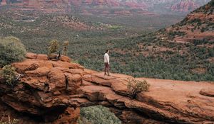 Preview wallpaper man, alone, canyon, rocks, view