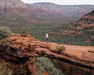 Preview wallpaper man, alone, canyon, rocks, view