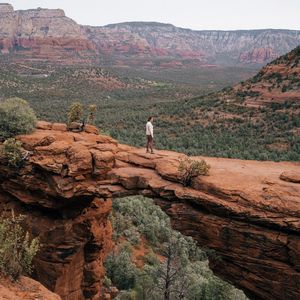 Preview wallpaper man, alone, canyon, rocks, view