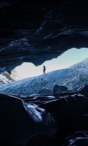 Preview wallpaper man, alone, cave, rocks, ice