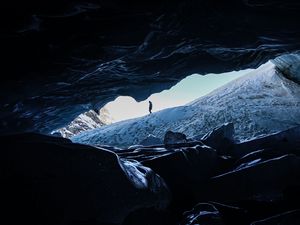 Preview wallpaper man, alone, cave, rocks, ice