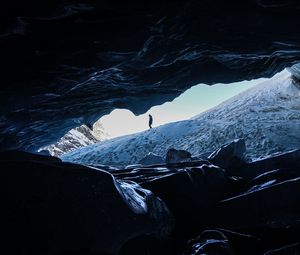 Preview wallpaper man, alone, cave, rocks, ice