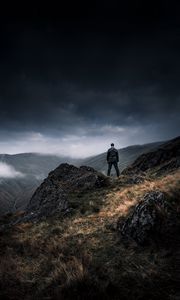 Preview wallpaper man, alone, cliff, mountains