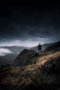 Preview wallpaper man, alone, cliff, mountains