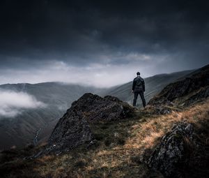 Preview wallpaper man, alone, cliff, mountains