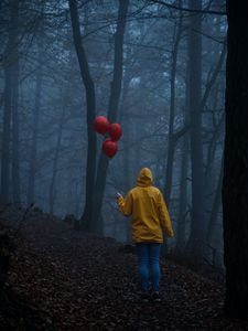 Preview wallpaper man, alone, cloak, balls, forest, gloomy