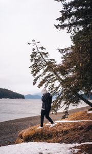 Preview wallpaper man, alone, coast, river, trees