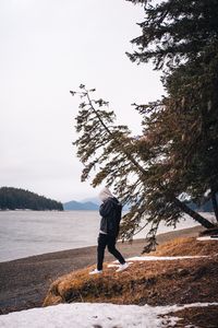 Preview wallpaper man, alone, coast, river, trees