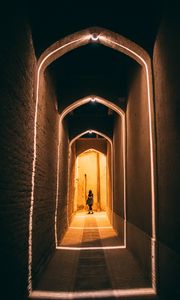 Preview wallpaper man, alone, corridor, light, architecture