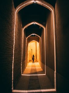 Preview wallpaper man, alone, corridor, light, architecture