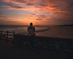 Preview wallpaper man, alone, embankment, water, sunset