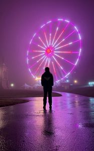 Preview wallpaper man, alone, ferris wheel, neon, fog, night