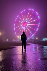 Preview wallpaper man, alone, ferris wheel, neon, fog, night