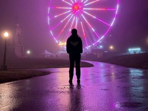 Preview wallpaper man, alone, ferris wheel, neon, fog, night