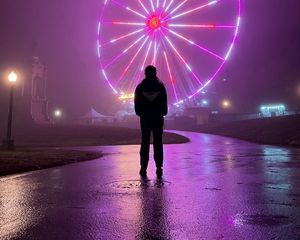 Preview wallpaper man, alone, ferris wheel, neon, fog, night