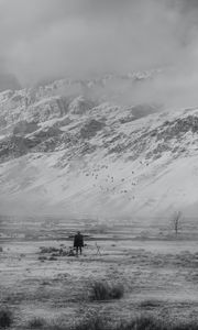 Preview wallpaper man, alone, freedom, gesture, mountains, snow, black and white