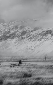 Preview wallpaper man, alone, freedom, gesture, mountains, snow, black and white