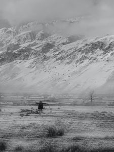 Preview wallpaper man, alone, freedom, gesture, mountains, snow, black and white