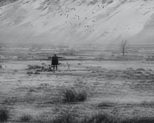 Preview wallpaper man, alone, freedom, gesture, mountains, snow, black and white